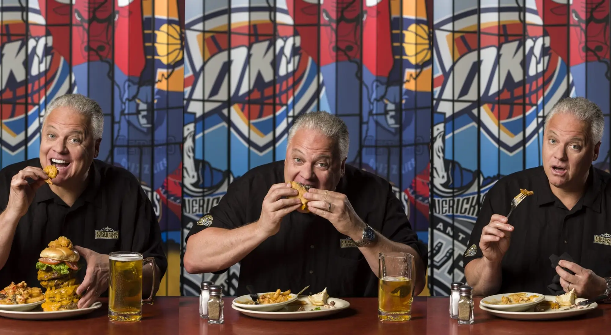 Bobby Hebert digging into a burger with friends at the restaurant