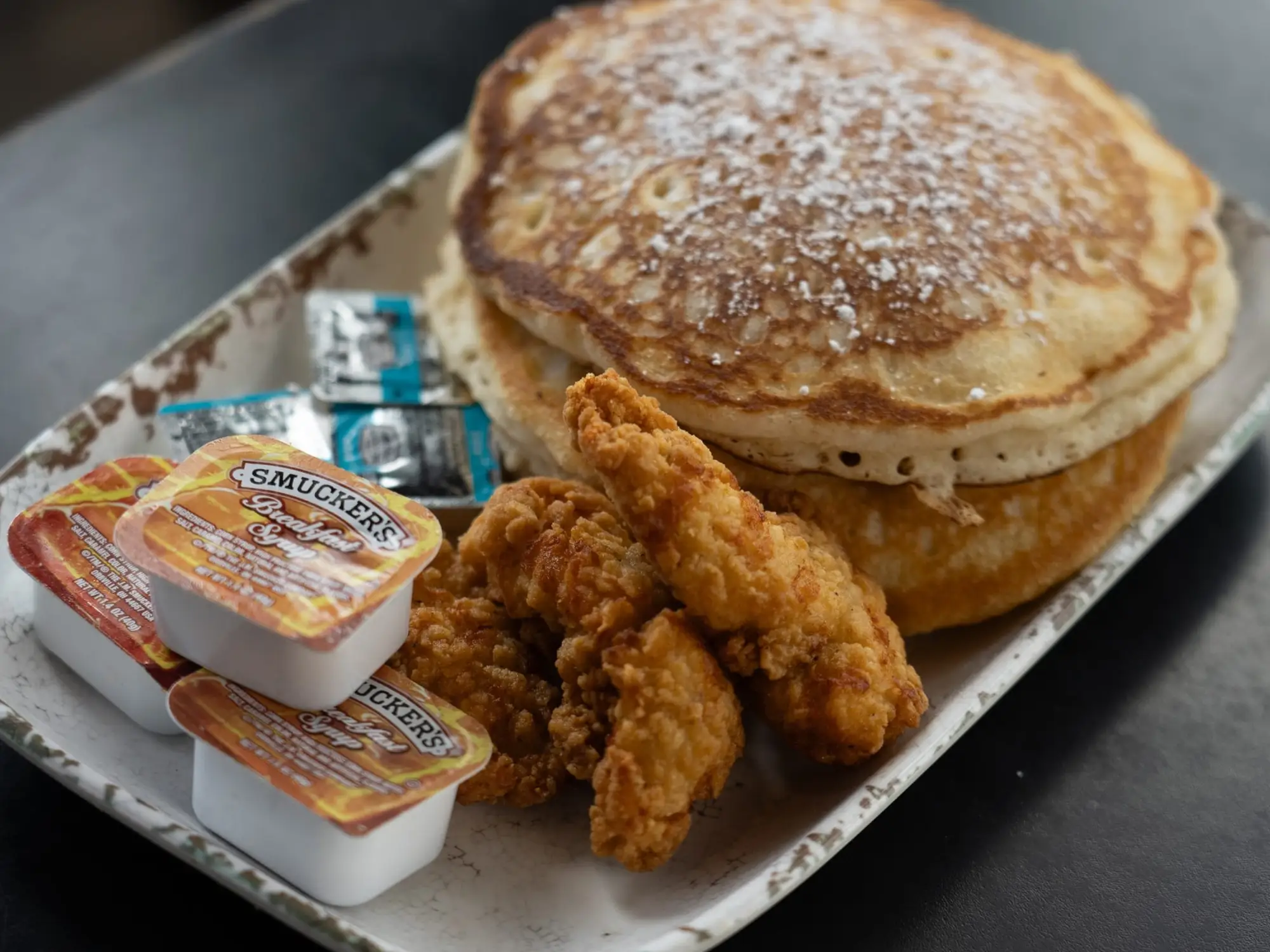 Chicken & Pancakes from the Game Day Brunch: golden chicken strips on a stack of pancakes