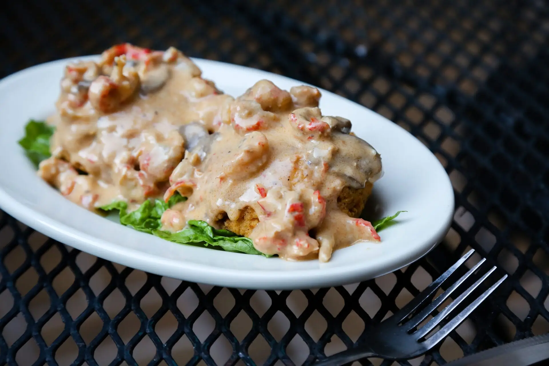 Who Dat! Crab Cakes topped with crawfish mushroom cream sauce