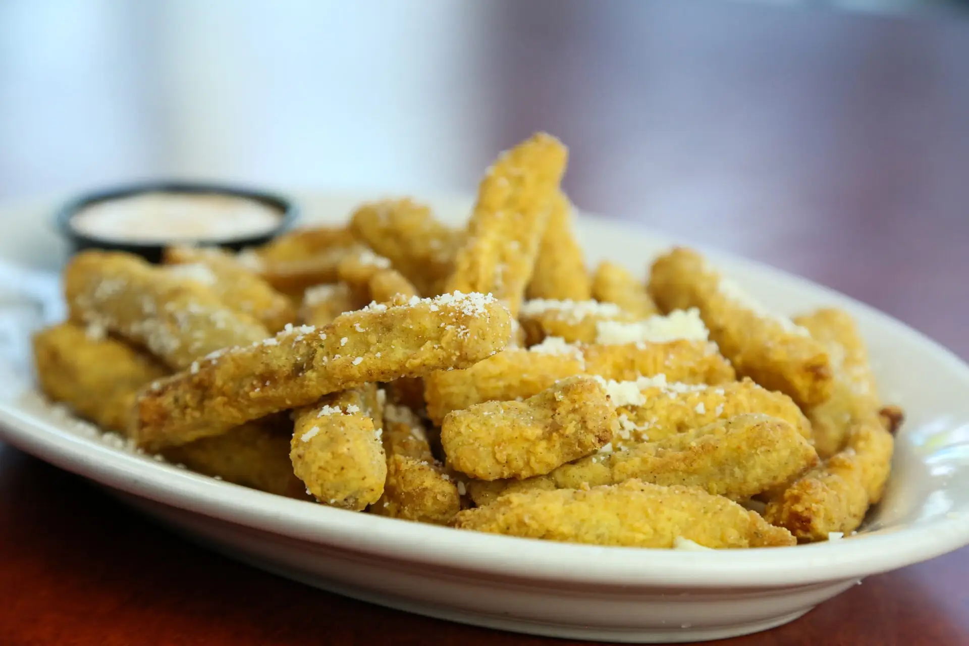 Golden fried eggplant sticks with remoulade sauce