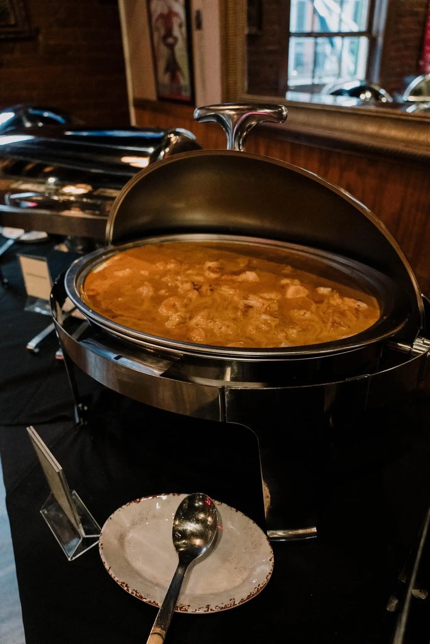 Gumbo in a round chafing dish