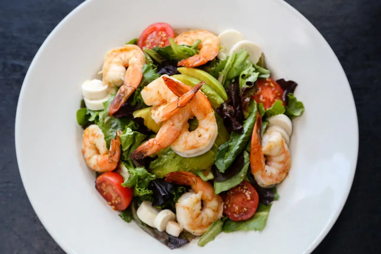 JoJo’s Salad: grilled Gulf shrimp, avocado, tomatoes and hearts of palm on mixed greens